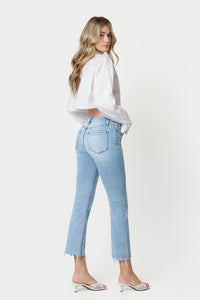 Stirringly High Rise Uneven Raw Hem Kick Flare Jeans