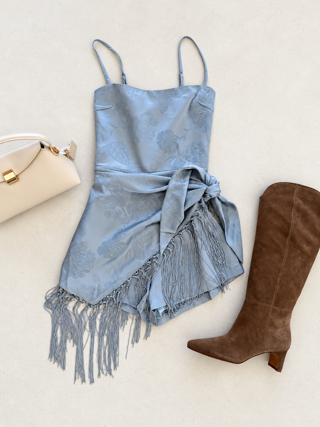 Jonie Waist Wrap Fringe Satin Romper in Ash Blue